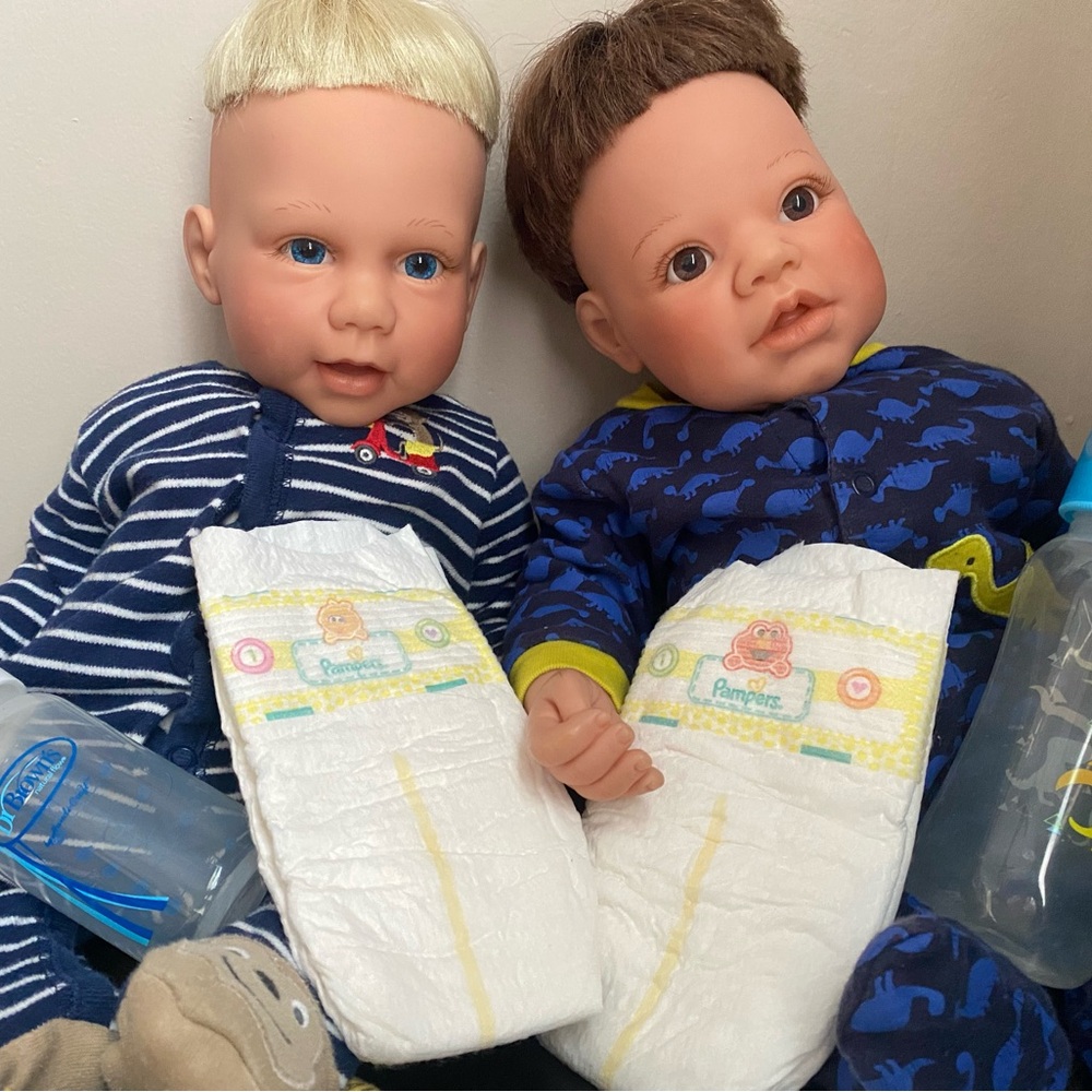 Realistic Baby Dolls with Blue and Brown eyes.
